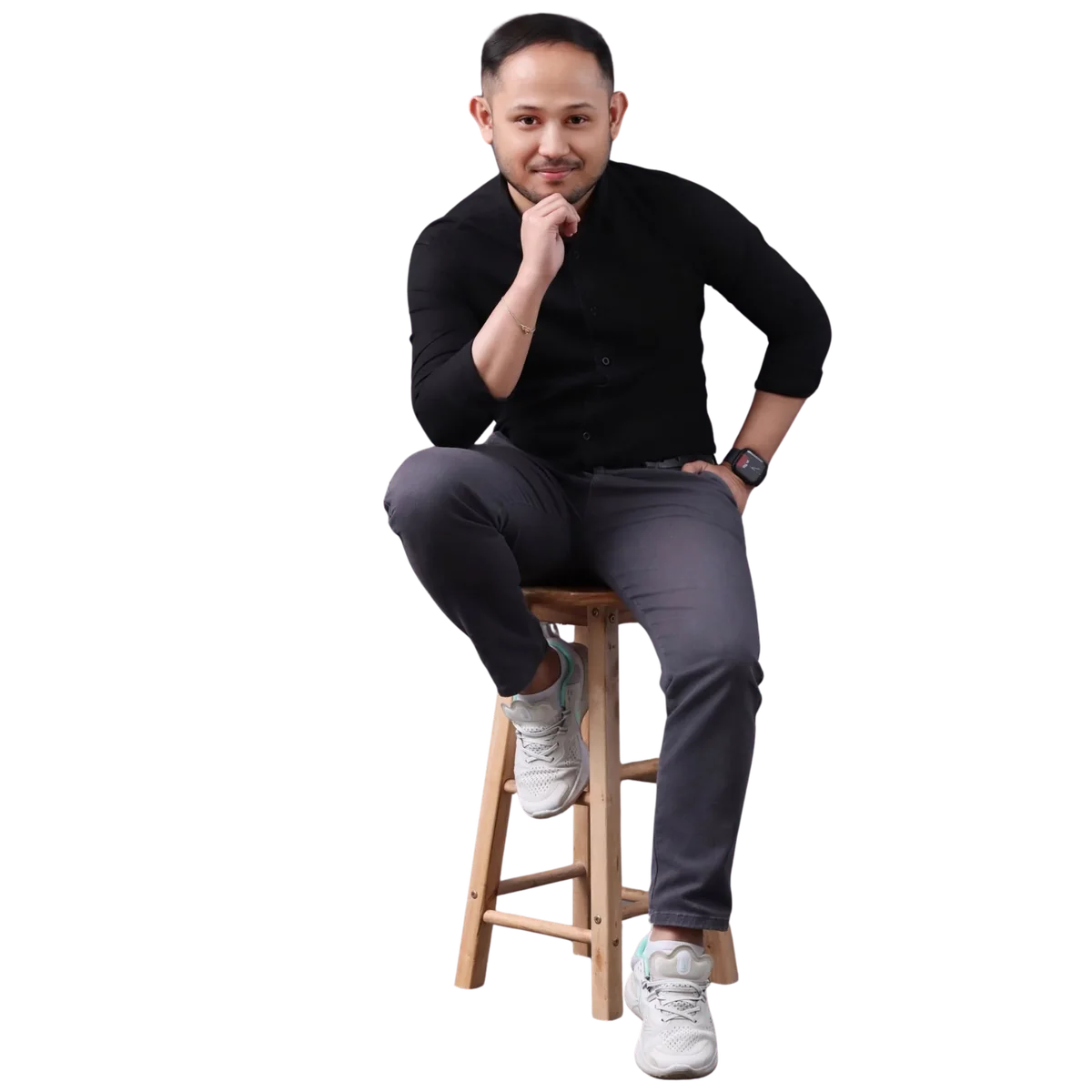 Carl Labajo seated on a stool